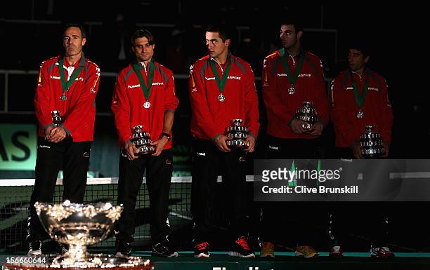 Team Captain Alex Corretja,David Ferrer,Nicolas Almagro,Marcel Granollers and Marc Lopez show their dejection on the rostrum with their runners up...