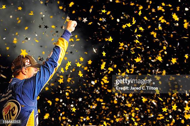 Brad Keselowski, driver of the Miller Lite Dodge, celebrates in Champion Victory Lane after winning the series championship and finishing in...