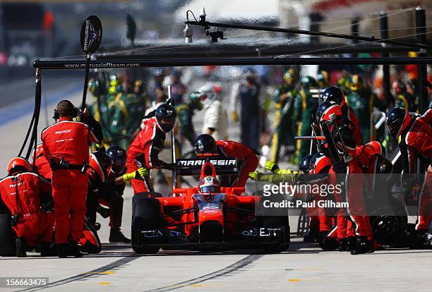 Timo Glock of Germany and Marussia stops for a pitstop during the United States Formula One Grand Prix at the Circuit of the Americas on November 18,...
