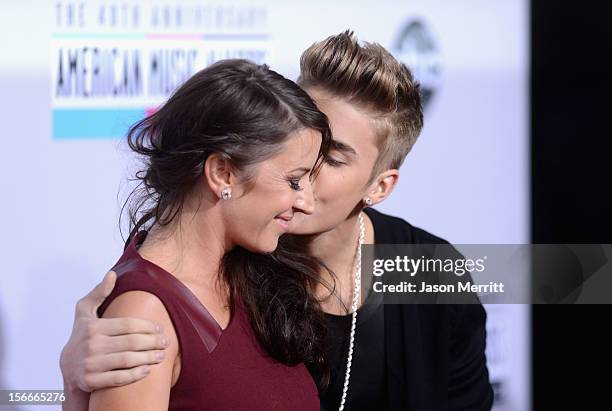 Singer Justin Bieber and mother Pattie Malette attend the 40th American Music Awards held at Nokia Theatre L.A. Live on November 18, 2012 in Los...