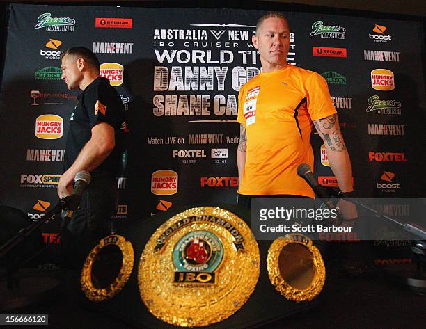 Danny Green of Australia and Shane Cameron of New Zealand look on after facing off during a press conference at Crown Entertainment Complex on...