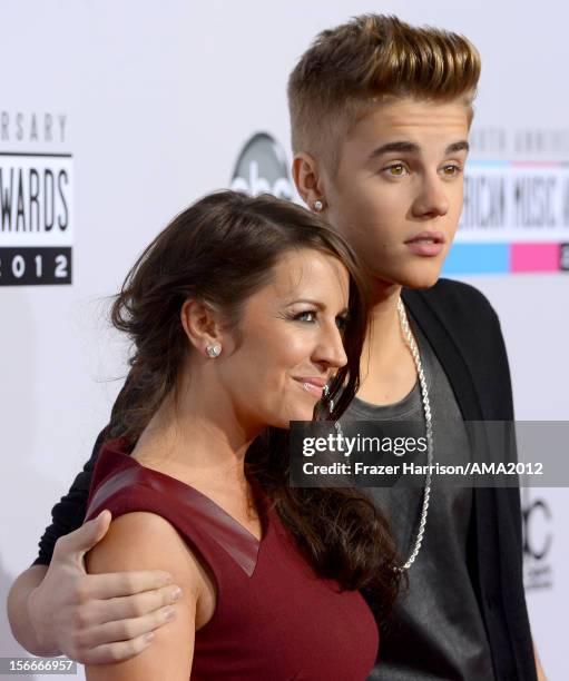 Singer Justin Bieber and mother Pattie Malette attend the 40th American Music Awards held at Nokia Theatre L.A. Live on November 18, 2012 in Los...