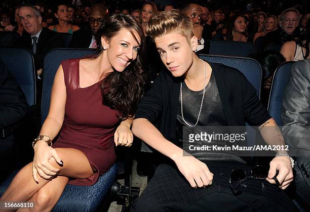 Singer Justin Bieber and Pattie Malette pose in the audience at the 40th American Music Awards held at Nokia Theatre L.A. Live on November 18, 2012...