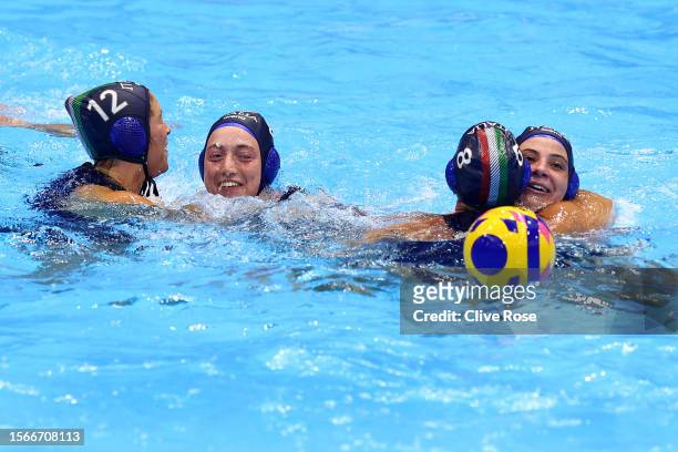 Team Italy celebrate winning their Women's Water Polo Quarterfinal match between Team United States and Team Italy on day nine of the Fukuoka 2023...