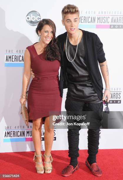 Recording artist Justin Bieber and mom Pattie Mallette arrive at The 40th American Music Awards at Nokia Theatre L.A. Live on November 18, 2012 in...