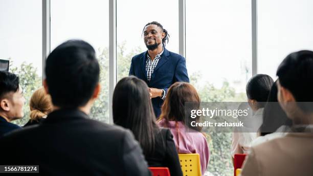 african american coworkers in meeting - succession planning stock pictures, royalty-free photos & images