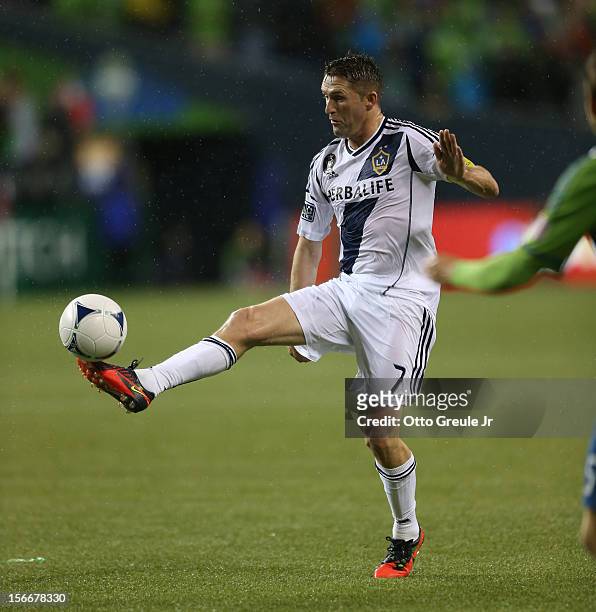 Robbie Keane of the Los Angeles Galaxy dribbles against the Seattle Sounders FC during Leg 2 of the Western Conference Championship at CenturyLink...