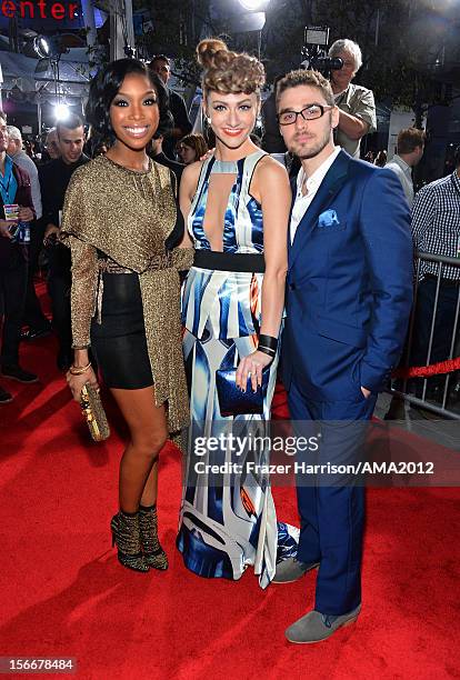 Singer Brandy with singers Amy Heidemann and Nick Noonan of Karmin attend the 40th American Music Awards held at Nokia Theatre L.A. Live on November...