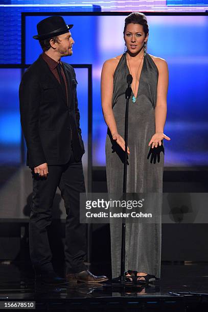 Singers Gavin DeGraw and Colbie Caillat speak onstage during the 40th Anniversary American Music Awards held at Nokia Theatre L.A. Live on November...