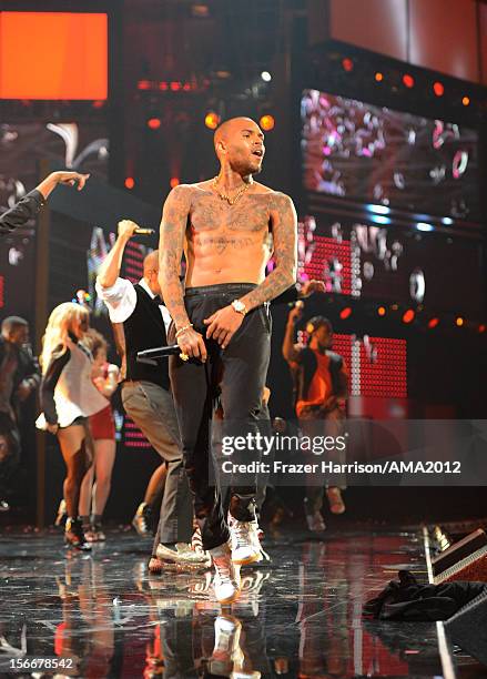 Singer Chris Brown performs on stage at the 40th American Music Awards held at Nokia Theatre L.A. Live on November 18, 2012 in Los Angeles,...