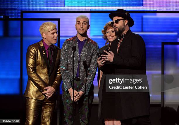 Musicians Chris Allen, Tyler Glenn, Elaine Bradley and Branden Campbell of Neon Trees speak onstage during the 40th Anniversary American Music Awards...