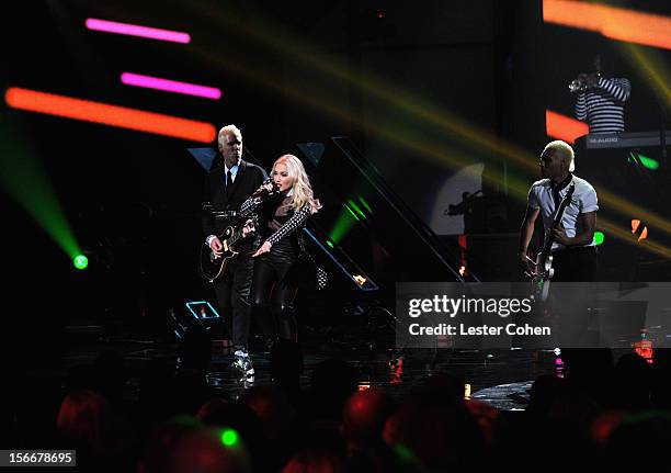 Musician Tom Dumont, singer Gwen Stefani, and Tony Kanal of No Doubt perform onstage during the 40th Anniversary American Music Awards held at Nokia...