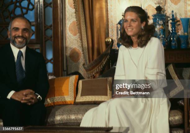 King Hussein of Jordan and his American bride Elizabeth Halaby are pictured after their wedding ceremony in Amman, Jordan, June 17th 1978....