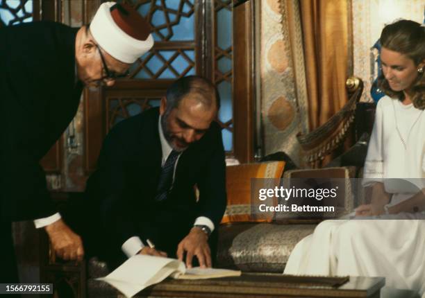 King Hussein of Jordan and his American bride Elizabeth Halaby are pictured after their wedding ceremony in Amman, Jordan, June 17th 1978....