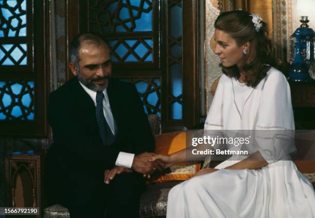 King Hussein of Jordan and his American bride Elizabeth Halaby are pictured after their wedding ceremony in Amman, Jordan, June 17th 1978....