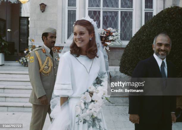 King Hussein of Jordan and his American bride Elizabeth Halaby are pictured after their wedding ceremony in Amman, Jordan, June 17th 1978....
