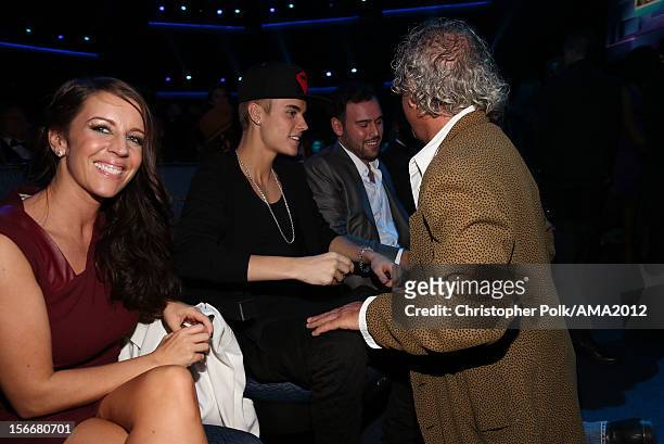 Pattie Malette, singer Justin Bieber, talent manager Scooter Braun and producer of the American Music Awards Larry Klein at the 40th American Music...