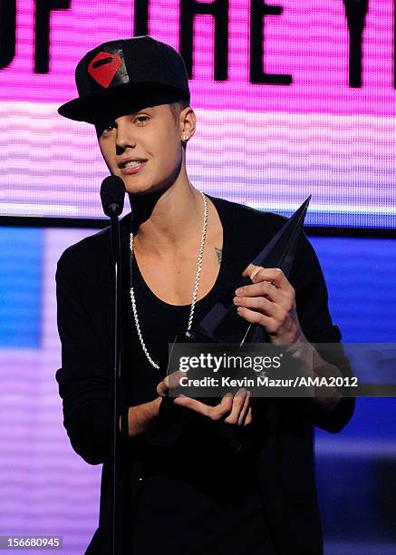 Singer Justin Bieber onstage at the 40th American Music Awards held at Nokia Theatre L.A. Live on November 18, 2012 in Los Angeles, California.