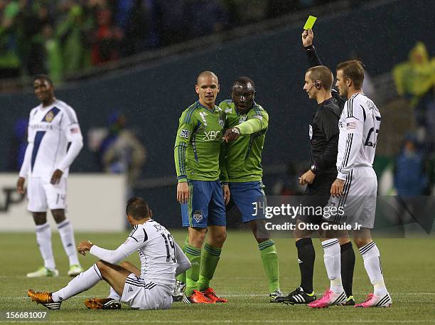 Jhon Kennedy Hurtado of the Seattle Sounders FC complains to the referee after Osvaldo Alonso was issued a yellow card while battling Juninho of the...