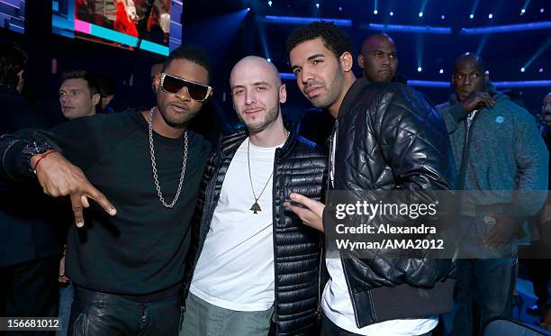 Usher, music producer Noah '40' Shebib and Drake at the 40th American Music Awards held at Nokia Theatre L.A. Live on November 18, 2012 in Los...