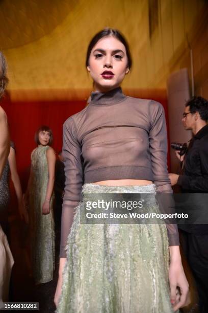 Backstage at Style Fashion Week, part of New York Fashion Week Autumn/Winter 2016/17, a model wears a top and skirt by designer Raul Penaranda, the...