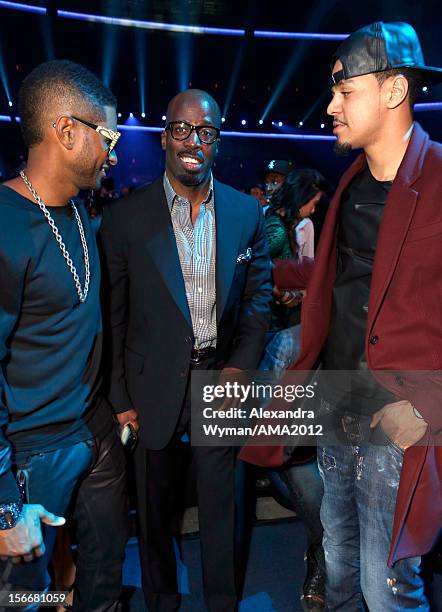 Usher, guest and J. Cole at the 40th American Music Awards held at Nokia Theatre L.A. Live on November 18, 2012 in Los Angeles, California.