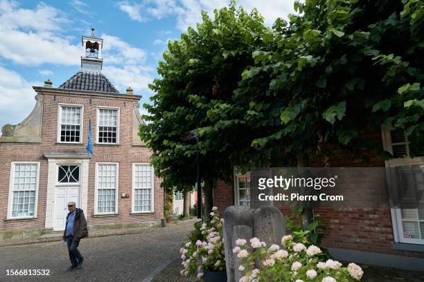 Man walks on the street on July 30, 2023 in Ootmarsum, Netherlands. Although the tiny Dutch nation exports a vast amount of agricultural goods...