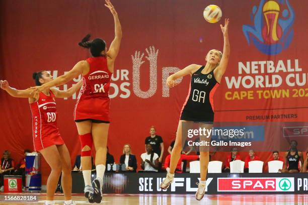 Helen Housby of England and Mo'onia Gerrard of Tonga in action during the Netball World Cup 2023 Pool F match between Tonga and England at Cape Town...