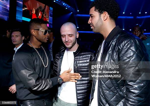 Usher, music producer Noah '40' Shebib and Drake at the 40th American Music Awards held at Nokia Theatre L.A. Live on November 18, 2012 in Los...