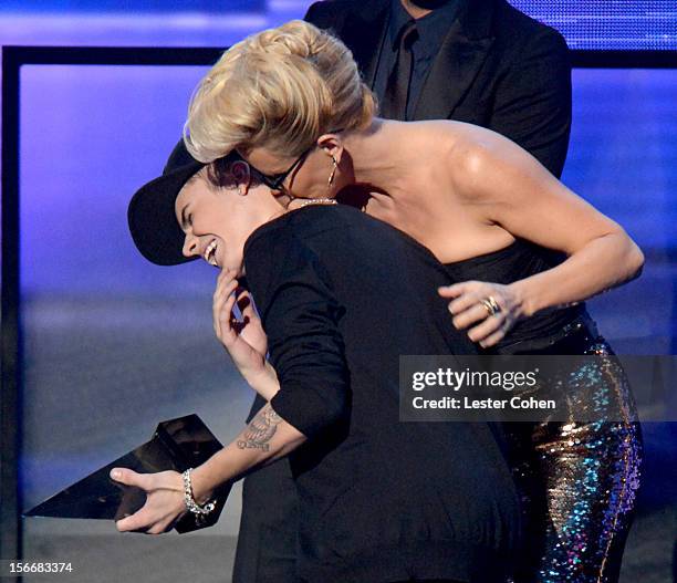 Singer Justin Bieber and actress Jenny McCarthy speak onstage during the 40th Anniversary American Music Awards held at Nokia Theatre L.A. Live on...