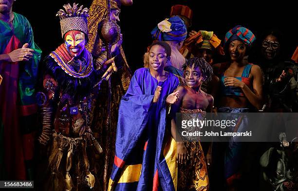 The cast of Lion King perform at the "The Lion King" On Broadway 15th Anniversary Celebration at the Minskoff Theatre on November 18, 2012 in New...