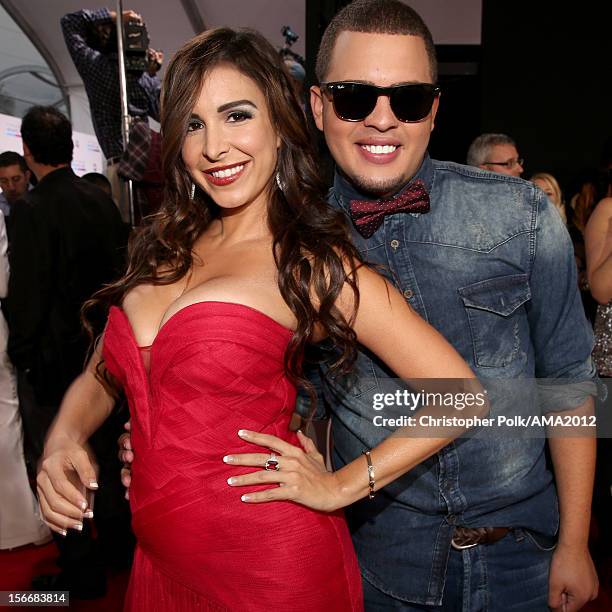 Model Mayra Veronica and DJ Mafio attend the 40th American Music Awards held at Nokia Theatre L.A. Live on November 18, 2012 in Los Angeles,...