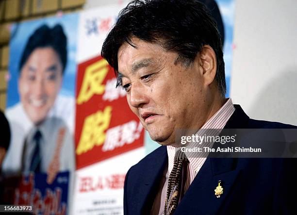 Nagoya City mayor and local party Genzei Nippon leader Takashi Kawamura speaks to the media reporters on November 17, 2012 in Nagoya, Aichi, Japan....