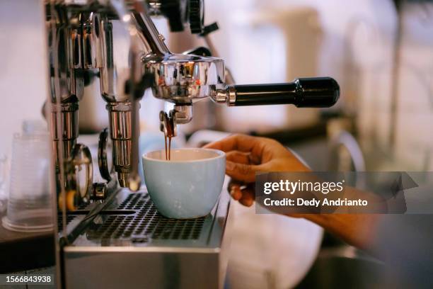 close up had making cofee with espresso machine cafe latte - coffee maker stock pictures, royalty-free photos & images