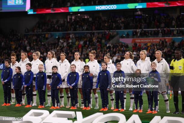 Germany players line up for the national anthem prior to the FIFA Women's World Cup Australia & New Zealand 2023 Group H match between Germany and...