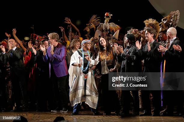 Composer Lebo M and director Julie Taymor and choreographer Garth Fagan take a bow during "The Lion King" Broadway 15th Anniversary Celebration at...