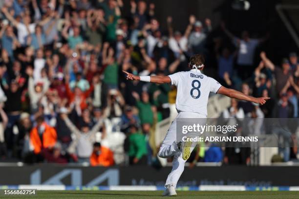 England's Stuart Broad celebrates after taking the final wicket, that of Australia's wicket keeper Alex Carey resulting in England's victory on day...