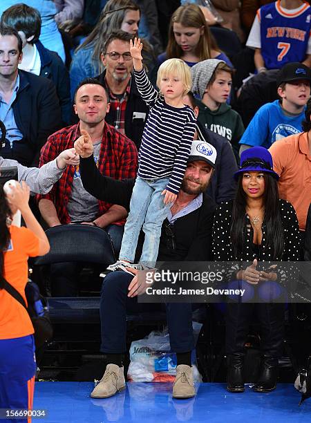 Liev Schreiber and son Alexander Schreiber attend New York Knicks verse Indiana Pacers game at Madison Square Garden on November 18, 2012 in New York...