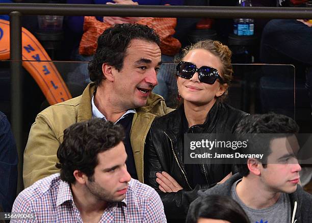 Olivier Sarkozy and Mary-Kate Olsen attend New York Knicks verse Indiana Pacers game at Madison Square Garden on November 18, 2012 in New York City.