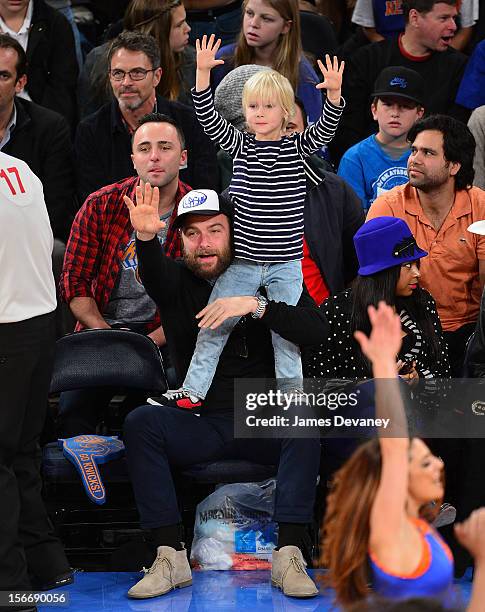 Liev Schreiber and son Alexander Schreiber attend New York Knicks verse Indiana Pacers game at Madison Square Garden on November 18, 2012 in New York...