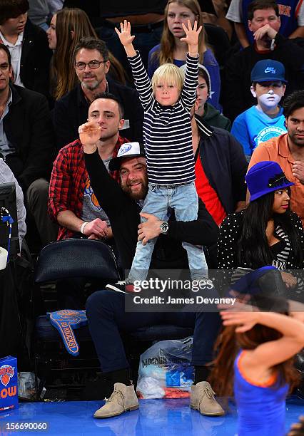 Liev Schreiber and son Alexander Schreiber attend New York Knicks verse Indiana Pacers game at Madison Square Garden on November 18, 2012 in New York...