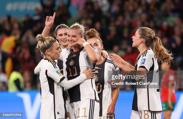 Alexandra Popp of Germany celebrates with teammates after scoring her team's second goal during the FIFA Women's World Cup Australia & New Zealand...