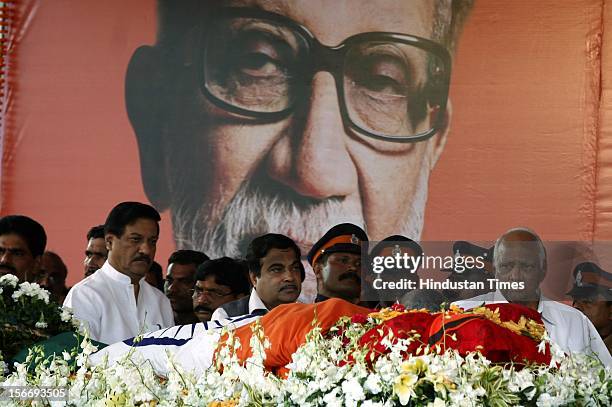 Prithviraj Chavan, Nitin Gadkari and Sharad Pawar pay their last respect to Bal Thackeray at Shivaji Park on November 18, 2012 in Mumbai, India. Bal...