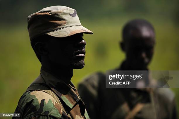 Rebels stand at a forward position in the hills of Kanyarucinya on the outskirts of Goma, in the east of the Democratic Republic of the Congo, on...