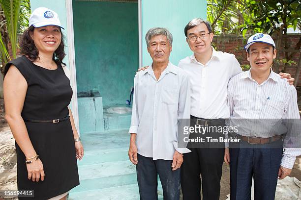 Marketing Vice President of Unilever Vietnam Nguyen Thi Bich Va, Mr. Nguyen Van Tu, CEO of World Toilet Organisation Jack Sim and Deputy Director of...