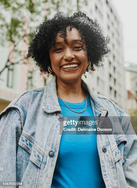 trendy mature black female - woman wearing denim jacket stock pictures, royalty-free photos & images
