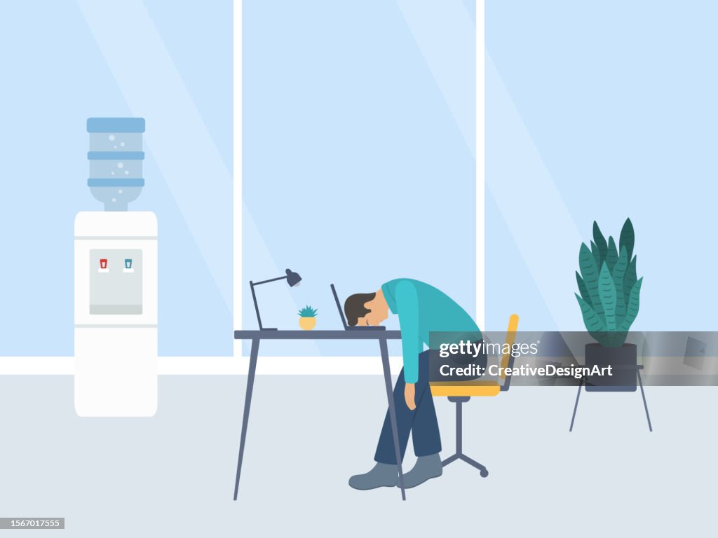 Burnout Concept With Tired Male Office Worker Sitting With Head Down On Laptop. Long Working Day