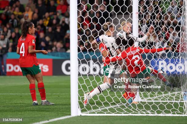 Lea Schueller and Alexandra Popp of Germany chase the ball as Yasmin Mrabet of Morocco scores an own goal to allow Germany fifth goal during the FIFA...