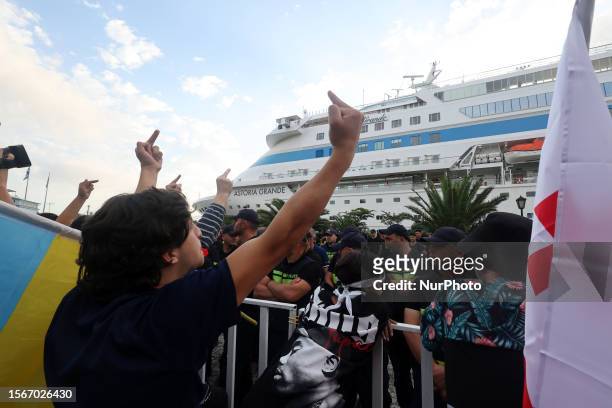 Demonstrators protest against the arrival of the Astoria Grande cruise ship, with some 800 mostly Russian passengers on board, Batumi, Georgia. NO...