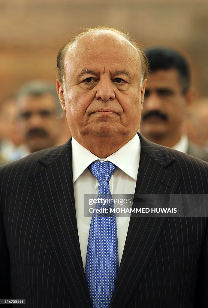 Yemen Ruler Yemeni President Abd Rabbo Mansour Hadi stands during the playing of ...